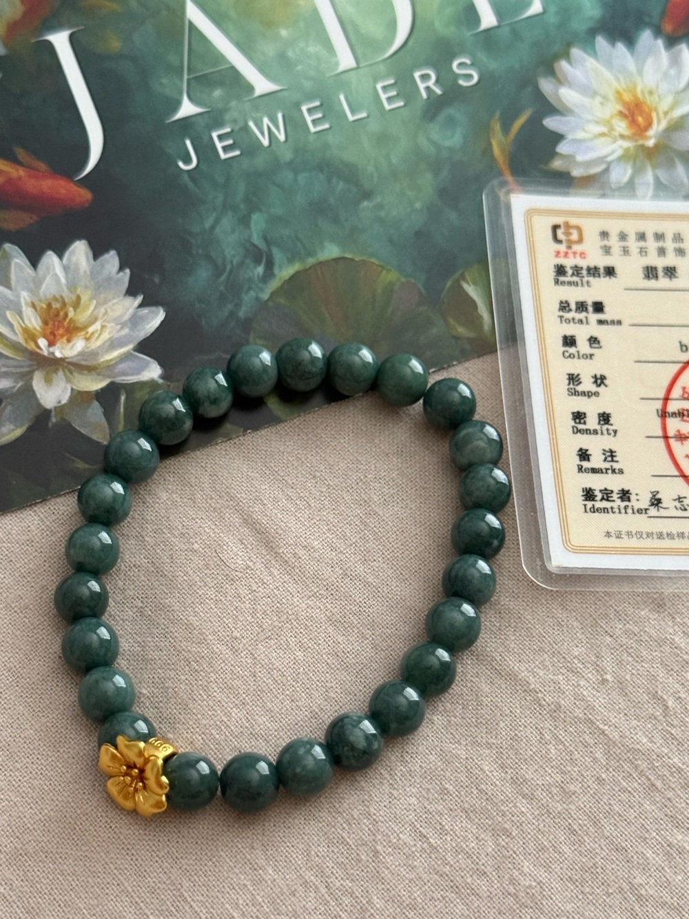Authentic grade a Jade Beaded Stretch Bracelet with Gold Flower Accent